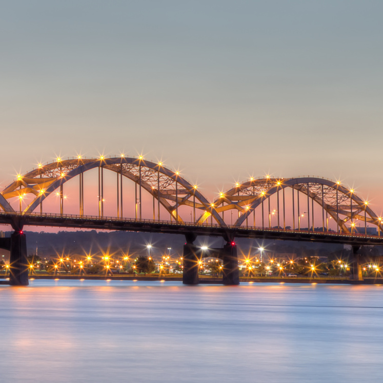 Centennial Bridge across the Mississippi River at dusk between Rock Island, Illinois and Davenport, Iowa